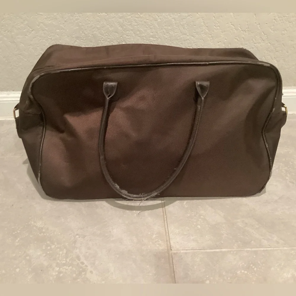 Paco Rabanne Brown Duffel Bag with Structured Design and Top Handles